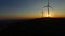 Close up of rotating windmill blades at sunset