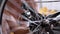 Close-up Rotation of a Bicycle Wheel, Pedals, Chain.