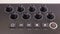 Close-up of a row of knobs on a MIDI Keyboard