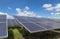 Close up rows array of polycrystalline silicon solar cells or photovoltaics in solar power plant