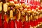 Close up rows Devotees hanging golden prayer bells for blessing at at Wong Tai Sin Temple, Hong Kong