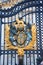 Close up the royal emblem on Buckingham palace entrance door