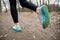 Close up runner female legs walking on the trail in the park outdoors