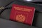Close up of Russia Passport in Black Suitcase Pocket