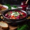 Close-up of Russian Borscht with Sour Cream and Bread