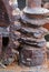 close up of a rusted ancient corroded cog and gear wheel on old broken industrial machinery