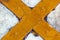 Close up of Rustic Yellow Metal Cross