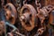 close-up of rusty tractor gears and chains