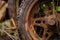 close-up of rusty tractor wheel and tire