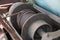 Close-up of a rusty winch with braided steel rope