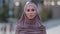 Close up sad upset muslim woman beautiful young islamic girl arabian lady in hijab stands in city feeling stress