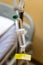 Close up saline solution drip for patient at hospital room
