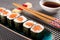 Close-up of salmon Hosomaki sushi served in restaurant