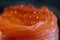 Close up Salmon Ikura Gunkan sushi.A popular Japanese food made of the basic ingredients with rice seaweed accompanied by salmon a