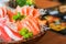 Close-up salmon raw sashimi on brown Japanese traditional dish o