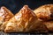 close-up of samsa, its crispy exterior and flaky dough visible