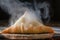 close-up of samsa, with steam rising from its filling