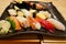 Close up of sashimi sushi set on black plate in Otaru japanese restaurant