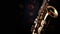 Close up of Saxophone, jazz music. Alto sax musical instrument on black background