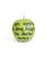 Close-up of sayings text on a juicy granny smith apple over white background