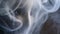 Close-up of scary ghostly face formed from swirling smoke. Mystery phantom visage