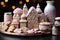 Close up scene featuring gingerbread house cookies on a vintage tray adorned with delightful miniature holiday figures and props,