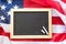 Close up of school blackboard on american flag