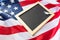 Close up of school blackboard on american flag