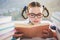 Close-up of schoolkid reading book in classroom