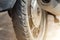 close up of screw nail puncturing car tire,motorcycle tire and bicycle tire