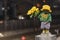 Close-up sculpture of a little boy Manneken pee peeing and holding sunflower flowers on the quay of hamamatsucho station in Tokyo