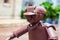 Close up of the sculpture of a man with a traditional wheelbarrow at the San Pedro Claver square in Cartagena de Indias