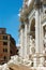 A close up of the sculptures at the front of the Trevi Fountain in Rome, Italy