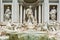 A close up of the sculptures at the front of the Trevi Fountain in Rome, Italy