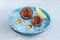 Close-up sea urchins open and ready to eat on ice in plate