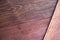 A close up section of Aromatic Red Cedar Lumber Wooden background.