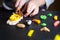 Close up and selective focus of little children hand playing with clay molding shapes