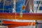 Close up of selective focus of ropes around mast support boom on boat in port of Alesund in Norway