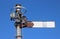 Close up semaphore railway signal against blue sky
