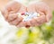 Close up of senior woman hands with pills