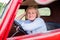 Close up of senior woman inside vintage pickup truck