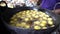 Close-up sense of Making Frying Fritters Indian Street food which is also known Pakoda