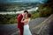 Close Up Sensitive Romantic Portrait Happy Beautiful Newlywed COuple Tenderly Hugging Background Landscape RIver Forest