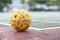 Close up Sepak takraw or Rattan ball in outdoor field with copy space.