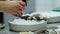 Close-up of serving fresh oysters with lemon as a snack on ice