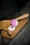 Close-up of shelf in the bathroom with different bath accessories.