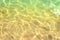 Close-up of shining sea water on gold sand beach. Koukounaries B
