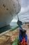 Close up of ship anchored to a steel dock anchor