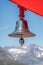 Close up of the Ships Bell of Hurtigrutens MS Fridtjof Nansen stamped 2019 off the Greenland coast