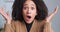 Close-up shocked female face, surprised reaction, afro american curly-haired girl heard amazing unexpected news opens